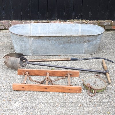 Lot 120 - A large galvanised trough, with vintage tools