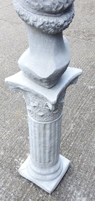 Lot 202 - A cast stone garden statue