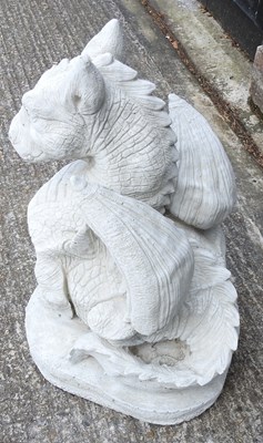 Lot 476 - A cast stone dragon