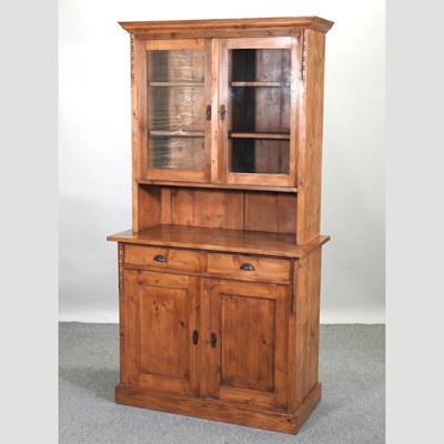 Lot 450 - A pine cabinet bookcase