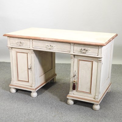 Lot 455 - A cream painted pedestal desk