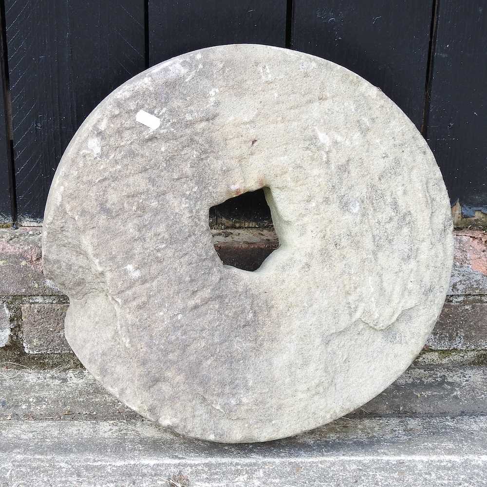 Lot 253 - An old mill stone