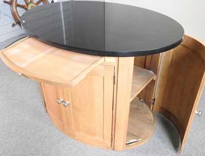 Lot 433 - An oak oval kitchen island