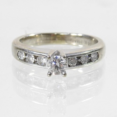 Lot 114 - A 14 carat gold diamond ring