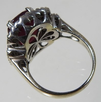 Lot 50 - A large 18 carat gold ruby and diamond ring