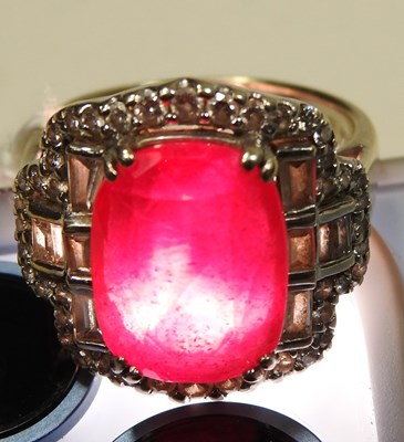 Lot 50 - A large 18 carat gold ruby and diamond ring