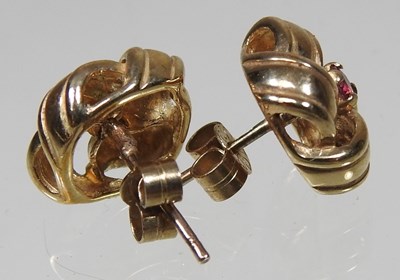 Lot 28 - A pair of 9 carat gold earrings