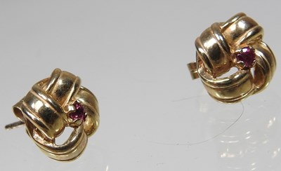 Lot 28 - A pair of 9 carat gold earrings