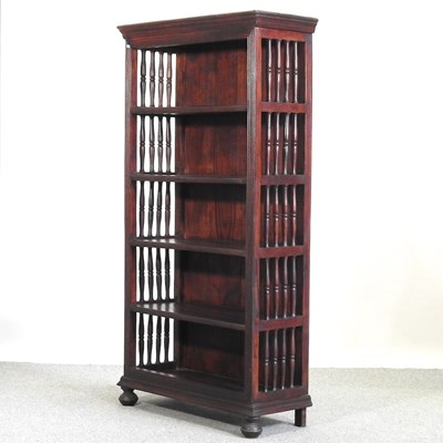 Lot 664 - A modern hardwood open bookcase