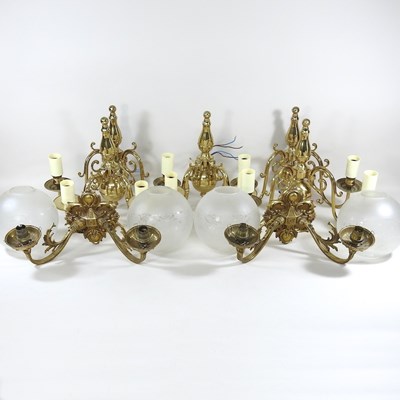 Lot 917 - Two sets of brass wall lights