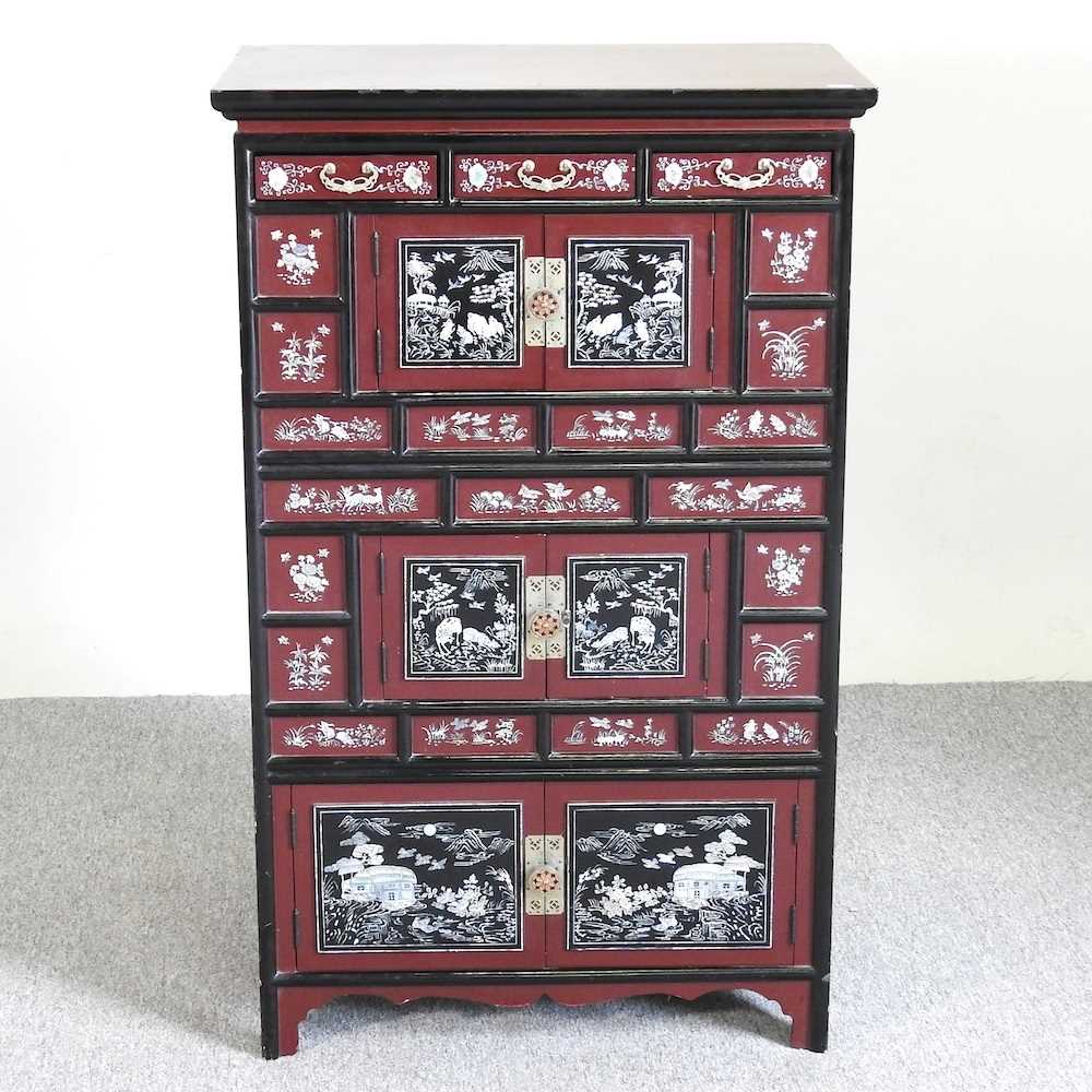 Lot 793 - A Chinese lacquered cabinet