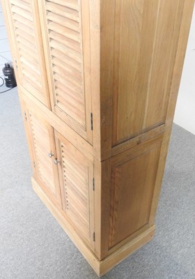 Lot 655 - An oak cabinet