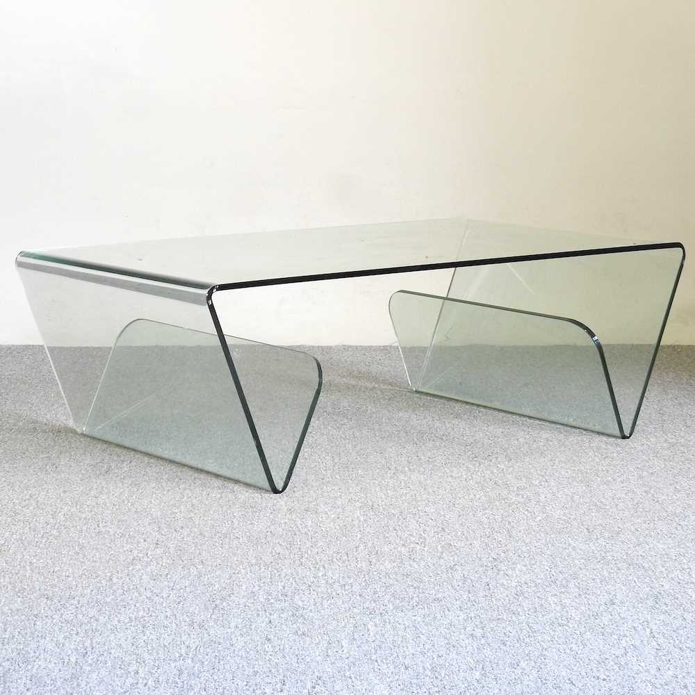 Lot 801 - A glass coffee table