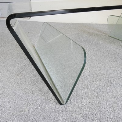 Lot 801 - A glass coffee table