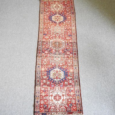 Lot 624 - A Persian heriz runner