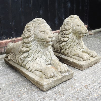 Lot 7 - A large pair of cast stone garden lions