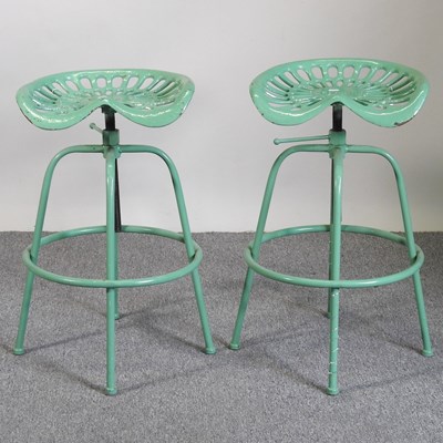 Lot 409 - A pair of tractor seat bar stools