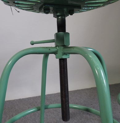 Lot 409 - A pair of tractor seat bar stools