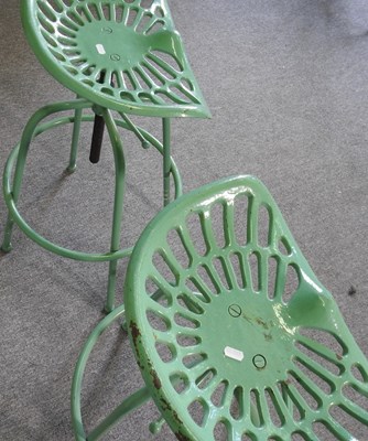 Lot 409 - A pair of tractor seat bar stools