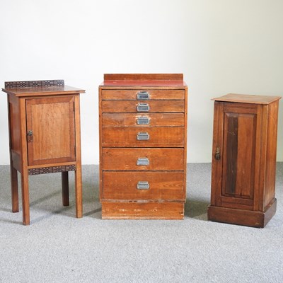 Lot 537 - A pine narrow chest and two cupboards