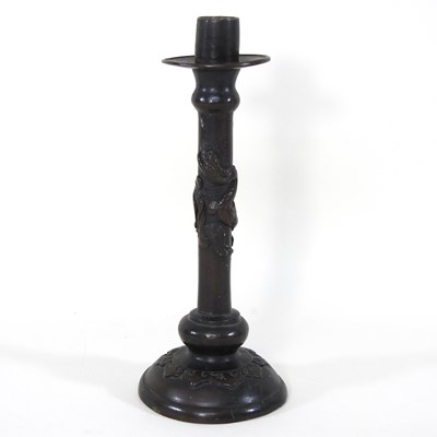 Lot 458 - A Chinese bronze candlestick