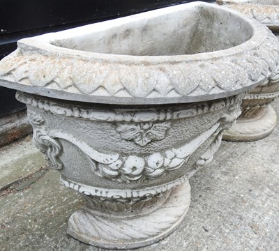 Lot 402 - A pair of cast stone garden pots