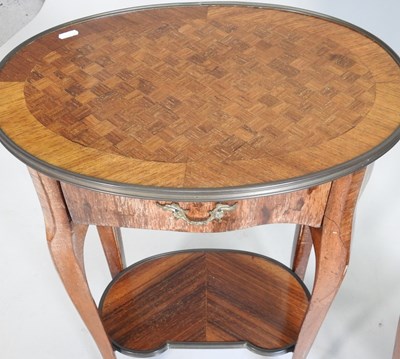 Lot 77 - A pair of French parquetry side tables