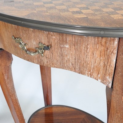Lot 77 - A pair of French parquetry side tables