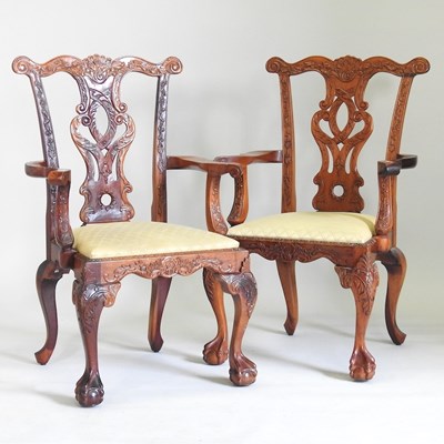 Lot 635 - A pair of Chippendale style elbow chairs