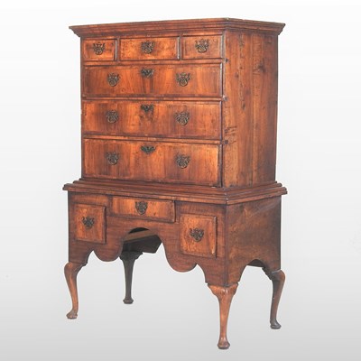 Lot 136 - A Queen Anne walnut and crossbanded chest on stand