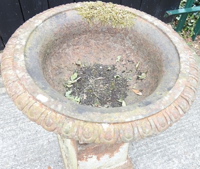 Lot 74 - A cast iron garden urn