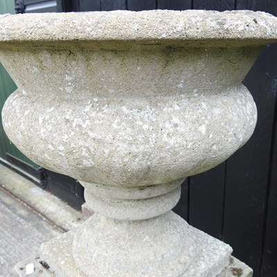 Lot 61 - A cast stone garden urn