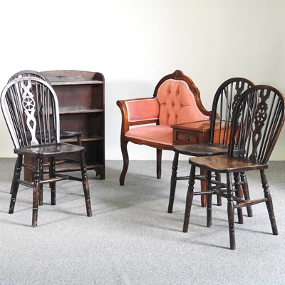 Lot 806 - A set of four wheel back chairs