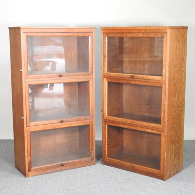 Lot 227 - A pair of glazed oak bookcases