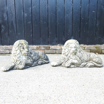 Lot 97 - A pair of cast stone lions