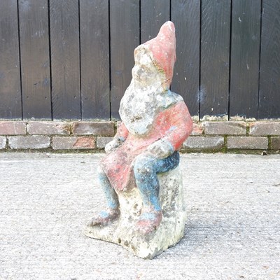 Lot 478 - A cast stone garden gnome