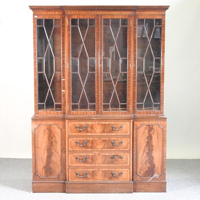 Lot 808 - A reproduction glazed bookcase