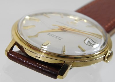 Lot 49 - A Watches of Switzerland 18 carat gold cased gentleman's vintage wristwatch