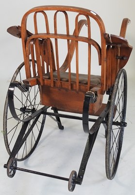 Lot 165 - A 19th century child's pull-along chair