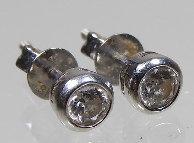 Lot 113 - A pair of 18 carat gold diamond stud earrings