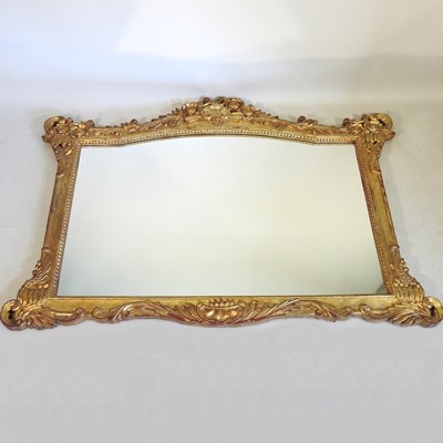 Lot 112 - A gilt overmantel mirror