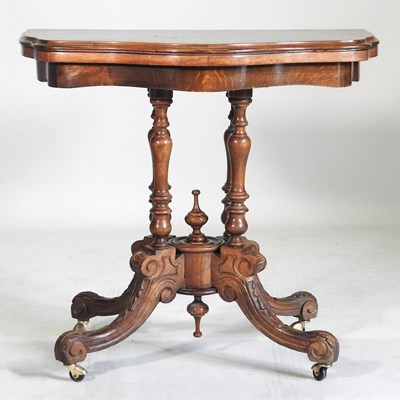 Lot 850 - A walnut card table