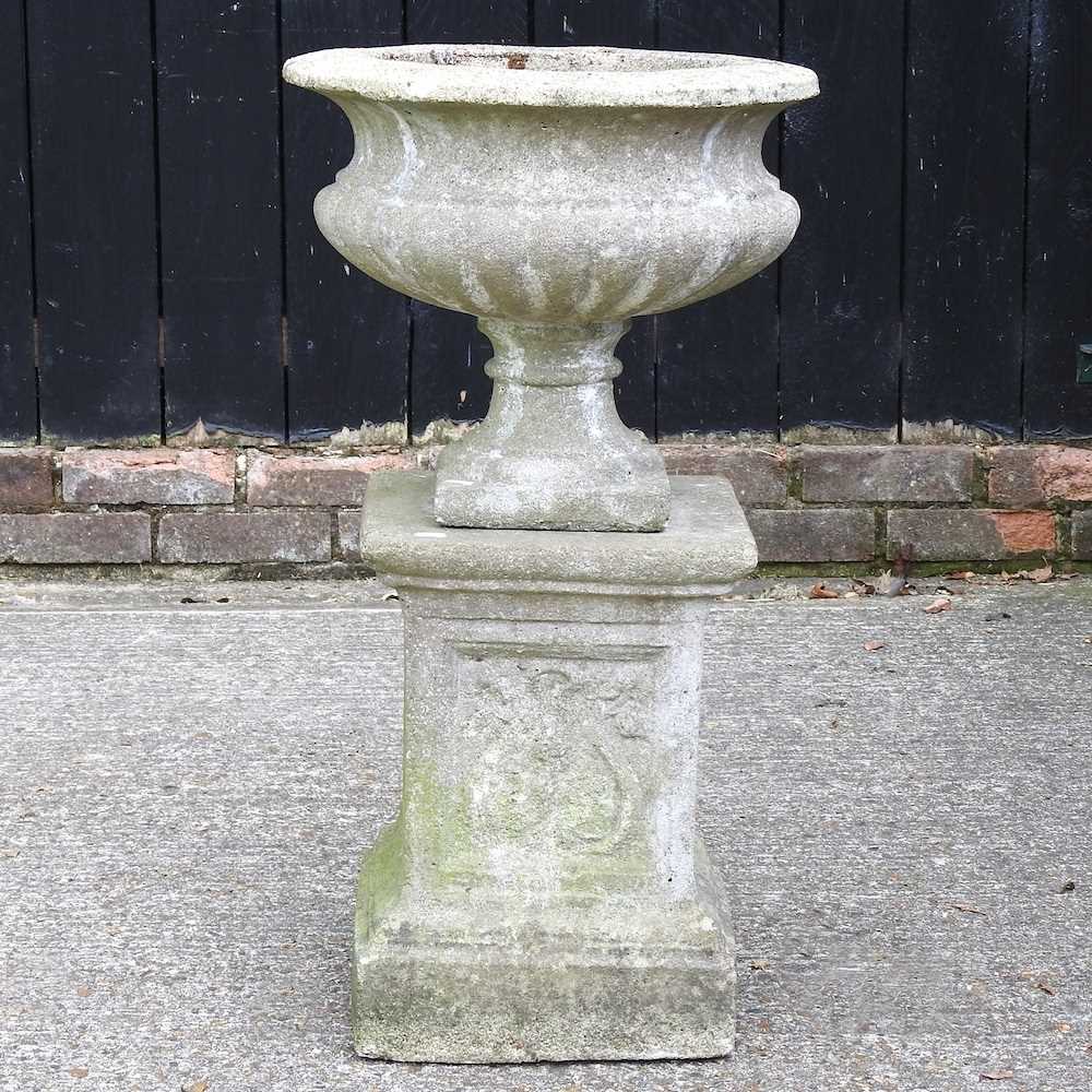 Lot 29 - A cast stone garden urn