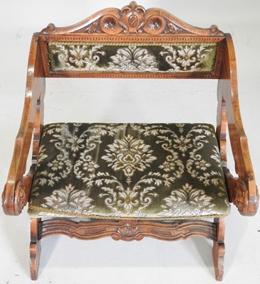 Lot 95 - An early 20th century continental carved oak armchair