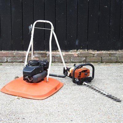 Lot 580 - A hedge cutter and lawn mower