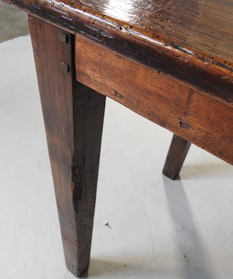 Lot 172 - A 19th century fruitwood dining table