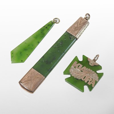Lot 150 - A jade coloured hardstone pendant