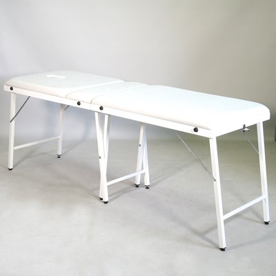 Lot 533 - A folding massage table