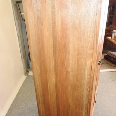 Lot 675 - A modern light oak wardrobe