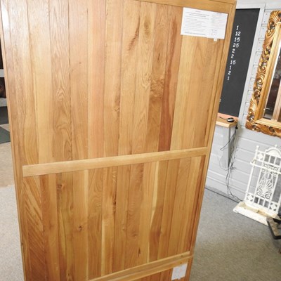 Lot 675 - A modern light oak wardrobe